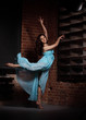Young brunette woman dancing Young brunette woman dancing