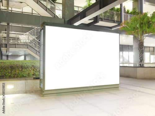 Photo: Blank billboard in modern building Blank billboard in modern building