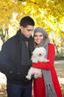 young couple with dog