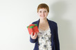 Cute redhead holding gift