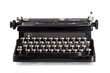 Vintage black typewriter isolated on white background.