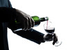 close up man hands pouring red wine in a glass