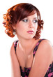 beautiful sad red haired girl isolated over white