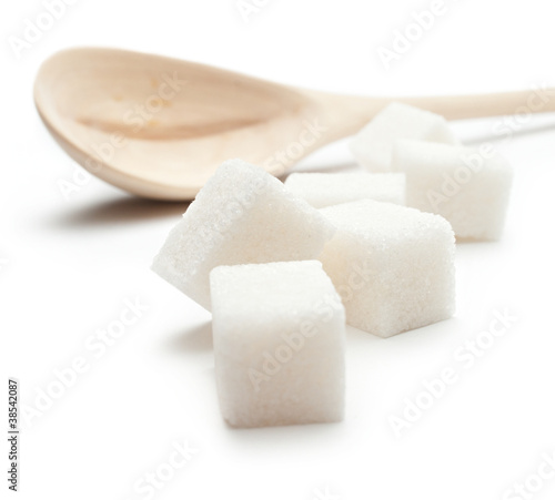 Photo: Cubes of sugar with wooden spoon Cubes of sugar with wooden spoon