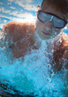 .Detail of young man swimming