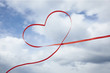 Red ribbon in heart shape