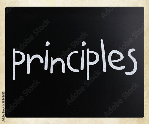 Illustration: "Principles" handwritten with white chalk on a blackboard "Principles" handwritten with white chalk on a blackboard