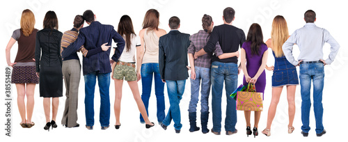 Photo: Back view group of people who are looking into the distance. Back view group of people who are looking into the distance.