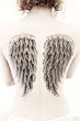 Photo: Sepia Woman Back Wing Tattoo Sepia Woman Back Wing Tattoo