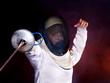 Child epee fencing lunge.