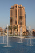 Highrise building and fountain in Doha, Qatar Highrise building and fountain in Doha, Qatar