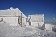 Snow covered, frozen meteorological station
