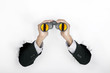 Businessman holding a binoculars