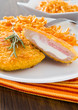 Chicken cordon bleu with grated carrots. Chicken cordon bleu with grated carrots.