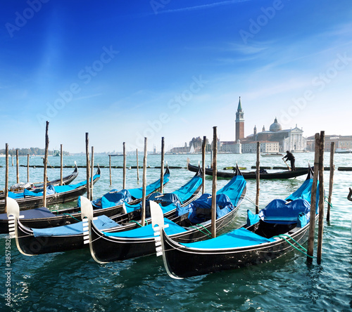 Photo: Gondolas on Grand Canal and San Giorgio Maggiore church in Venic Gondolas on Grand Canal and San Giorgio Maggiore church in Venic