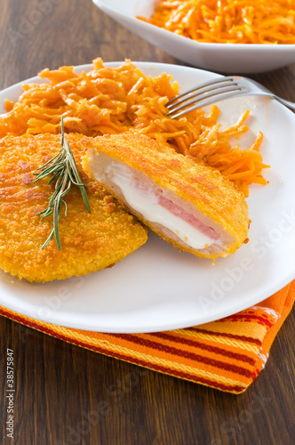 Photo: Chicken cordon bleu with grated carrots. Chicken cordon bleu with grated carrots.