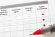 closeup of a survey form with agree remarks checked
