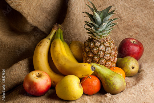 Photo: fresh various fruits on sacking fresh various fruits on sacking