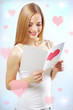 smiling girl with valentine card