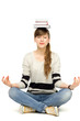 Woman balancing books on head