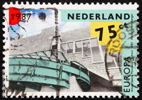 Photo: Postage stamp Netherlands 1987 Montessori School, Amsterdam Postage stamp Netherlands 1987 Montessori School, Amsterdam