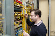 Network engineer jumpering fibre optic
