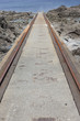 Rails leading into sea Rails leading into sea