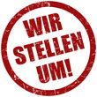 Grunge Stempel rot WIR STELLEN UM!
