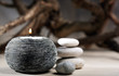 burning candle with pebbles. abstract still life burning candle with pebbles. abstract still life