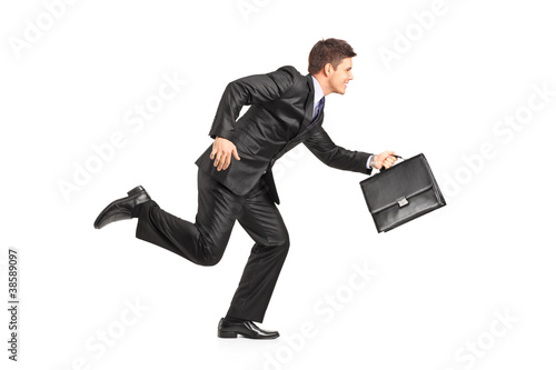 Photo: Businessman running with a briefcase Businessman running with a briefcase