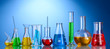 Different laboratory glassware with color liquid