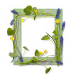 Wooden frame decorated by spring flowers
