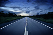 Remote road at sunset