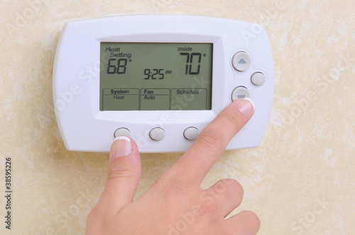 Photo: Thermostat setting the temperature Thermostat setting the temperature