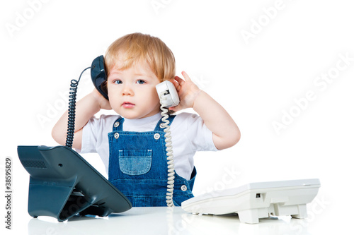 Photo: handsome boy talking on the phone handsome boy talking on the phone