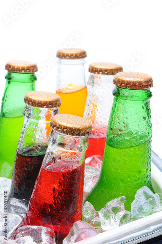 Photo: Assorted Soda Bottles in Ice Chest Assorted Soda Bottles in Ice Chest
