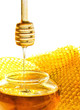 Honey dipper with bee honeycomb isolated on white Honey dipper with bee honeycomb isolated on white