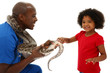 Vet and Preschool Child Snake Owner Helping Pet