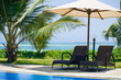 view of nice exotic bamboo hut on tropical beach