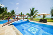 view of nice exotic bamboo hut on tropical beach
