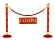 A velvet rope barrier, with a closed sign