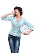 tired woman holding clock and yawning tired woman holding clock and yawning