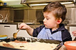 small child prepares the lunch or dinner