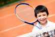 Boy playing tennis