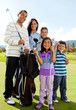 Family playing golf