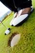 Photo: Golf player hitting the ball Golf player hitting the ball