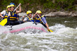 People whitewater rafting