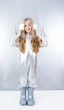 Astronaut girl with silver uniform and glass helmet