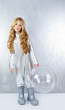 Astronaut girl with silver uniform and glass helmet Astronaut girl with silver uniform and glass helmet