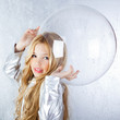 Astronaut girl with silver uniform and glass helmet Astronaut girl with silver uniform and glass helmet